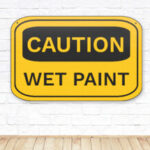 CAUTION WET PAINT