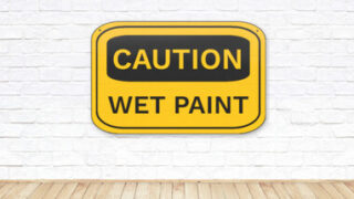 CAUTION WET PAINT